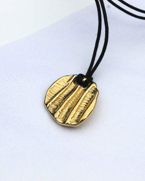 Fossil Pendant on Cotton Cord