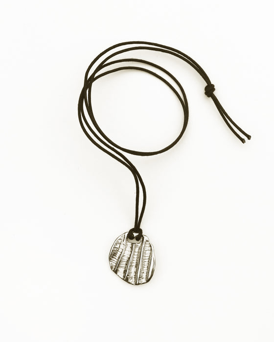 Fossil Pendant on Cotton Cord